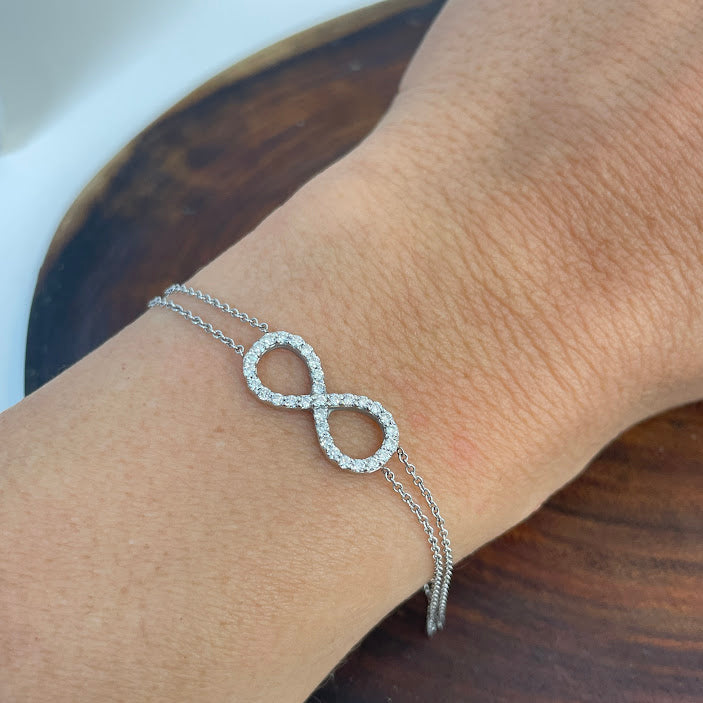 צמיד אינפיניטי זהב לבן 14K משובץ 0.35 קראט יהלומים טבעיים צבע F נקיון VS מק"ט 180