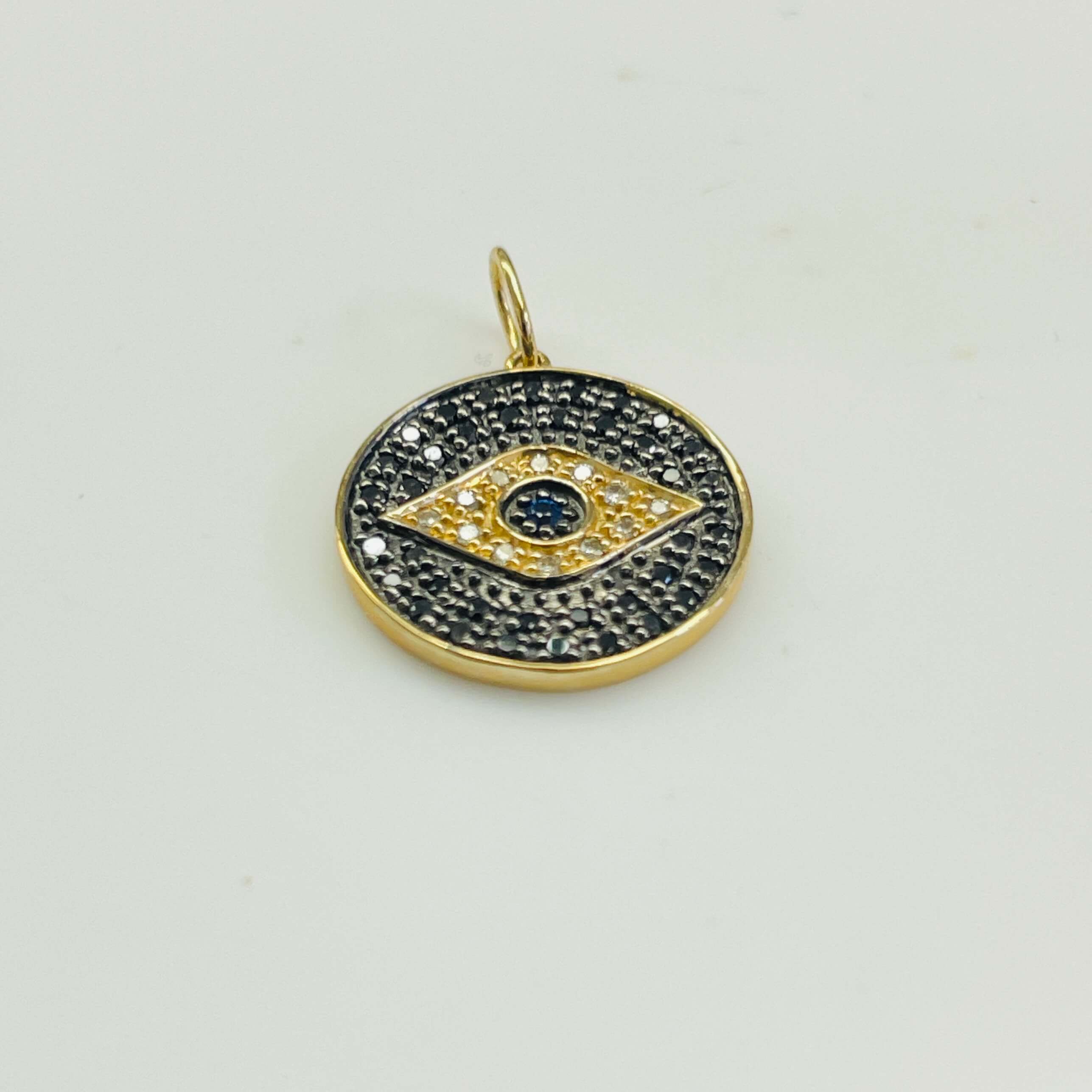 תליון עגול בצורת עין יהלומים שחורים ולבנים ואבן ספיר כחולה טבעיים 0.18 קראט יהלומים צבע F ניקיון VS זהב 14K צהוב מק״ט 629