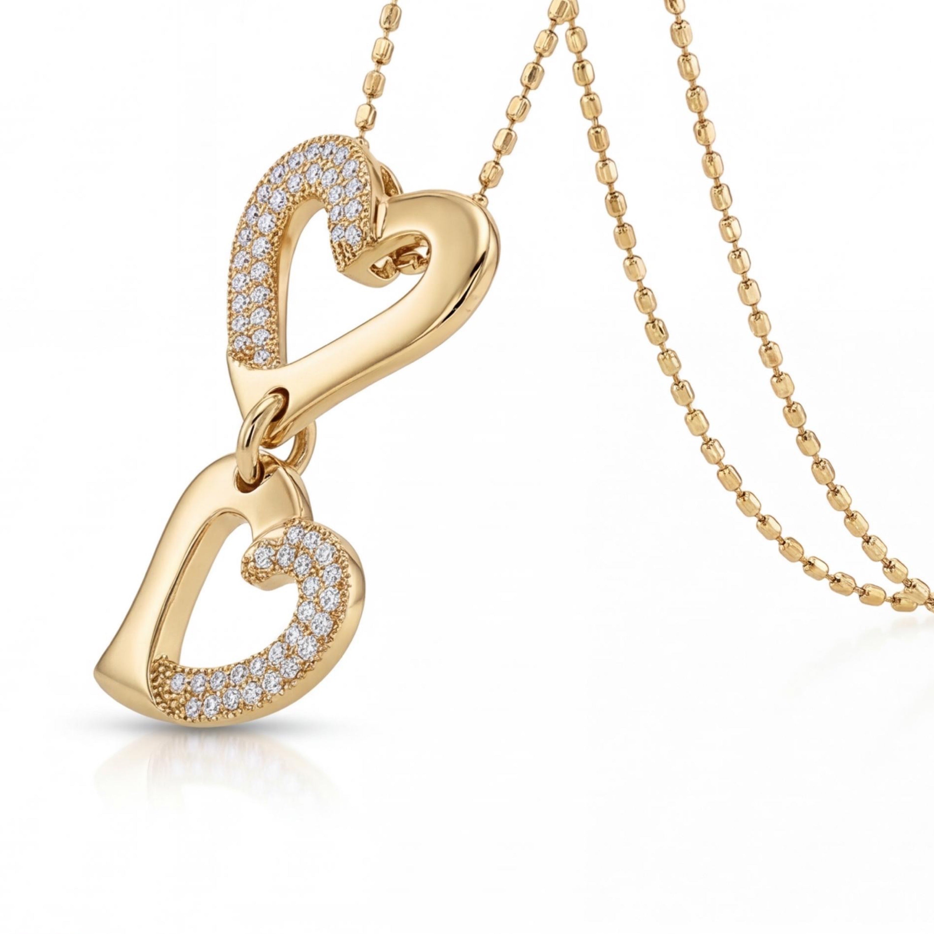 שרשרת זהב 18K צהוב שני תליוני לב חצאי שיבוץ יהלומים מק״ט 876